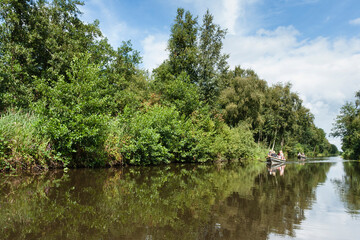 Fototapeta na wymiar Recreation at Nationaal Park de Weerribben in summer