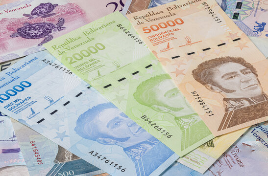 Close up to the currency of the south American country Venezuela. High inflation and weak economy increases the denomination of the banknotes. Bolivares or Bolivar money of the republic Venezuela 