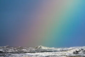 Fotobehang Rainbow over sea © AGAMI