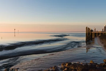 Foto auf Leinwand Sunset at Wadden Sea © AGAMI