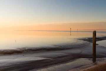 Muurstickers Sunset at Wadden Sea © AGAMI
