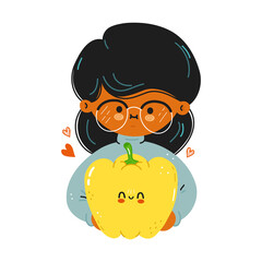 Young cute funny girl hold bell pepper in hand. Young woman hugs cute bell pepper. Isolated on white background