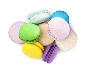 Fototapeta na wymiar Different delicious colorful macarons on white background, top view