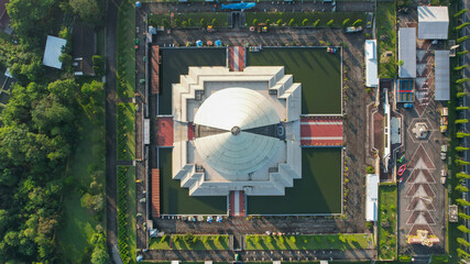 Aerial view of Monument to the Recapture of Yogyakarta. Historical Building in a Cone Shape. Monjali or Monumen Jogja Kembali. Central Java, Indonesia, July 1, 2021