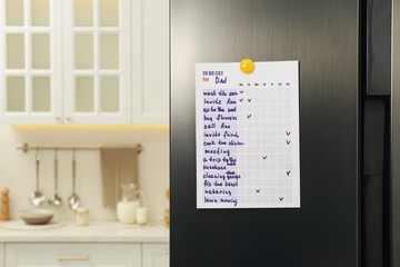 To do list with magnet on refrigerator indoors. Space for text