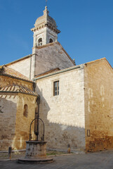  the Collegiate of Santi Quirico e Giulitta is an ancient tuscany stone church in the Val d'Orcia
