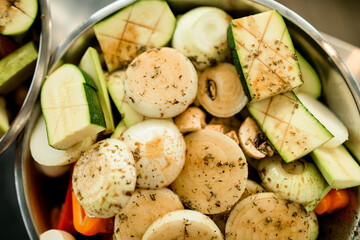 close-up of slices of chopped fresh vegetables sprinkled with seasoning