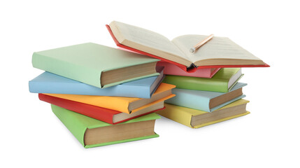 Many colorful hardcover books with pencil on white background
