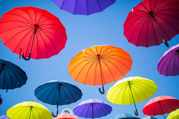 Colorful umbrellas against the sky.