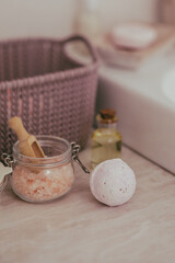 The bath bomb and other spa products in the bathroom