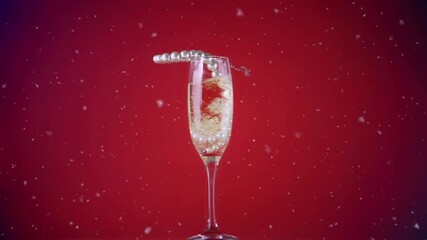 Animation of confetti falling and pearl necklace in champagne glass - Powered by Adobe