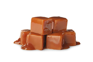 Caramel candies with topping on white background
