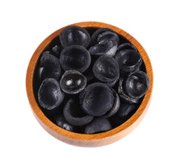 Macadamia charcoal on wooden bowl isolated on white background