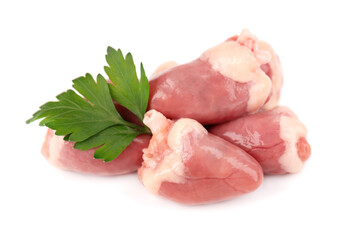 Chicken hearts raw isolated on white background. Fresh chicken broiler hearts with parsley leaves. Close up.