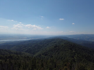 Mountain landscape with a distant lake in the background