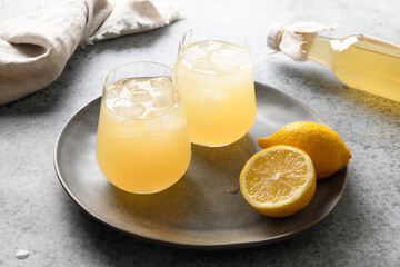 Homemade healthy kombucha beverage glasses with lemon. Organic probiotic drink.