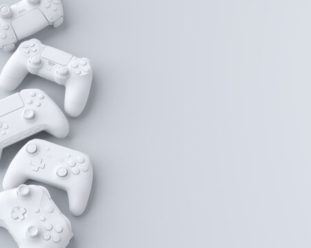 Set of lying gamer joysticks or gamepads on white background