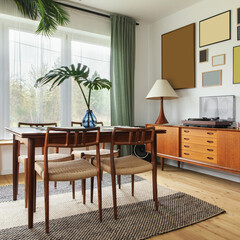 Modern scandinavian home interior of living room with design retro furniture, tropical palm,...
