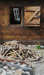traditional wooden house, with window and ropes outside, Isafjordur, Iceland