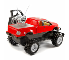 Fototapeta na wymiar red plastic radio contrlol toy pickup car