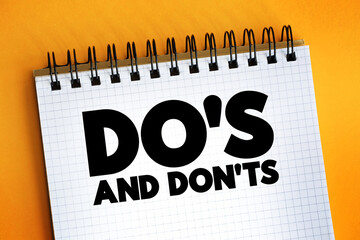 Do's And Don'ts text quote on notepad, concept background.