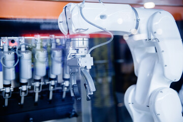 Closeup AI robot for working in industrial food factory packaging ice cream, Automated production...