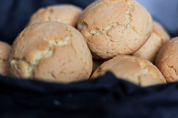 Delicious cookies in a beautiful black package. On a gray background.