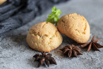 Delicious cookies in a beautiful black package. On a gray background.