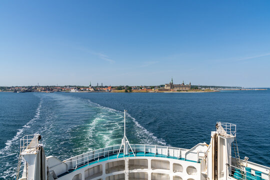 cityscape view of the Danish city of Helsingor and the ForSea Ferry crossing the Oresund Strait