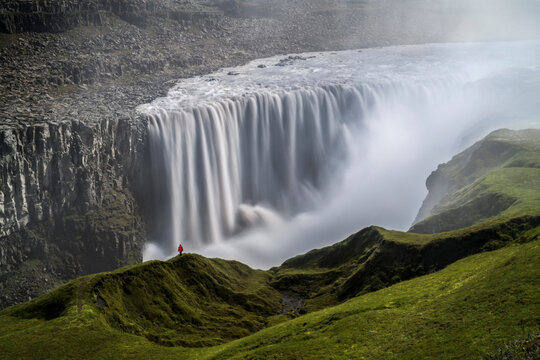 Person Staring over Dettifoss Waterfall, Vatnajökull National Park, Iceland