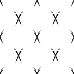 Seamless pattern with crossed umbrella canes. Vintage gentleman wallpaper.
