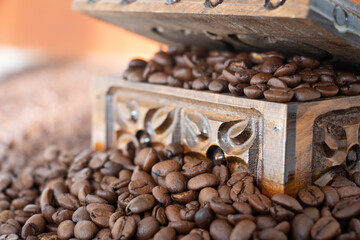 coffee beans in and around wooden crate