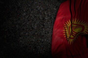 nice any celebration flag 3d illustration. - dark picture of Kyrgyzstan flag with large folds on dark asphalt with free place for your content