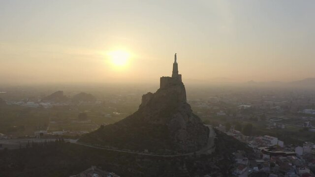 Beautiful Sky With Tinge of Hue From Sunset on Image of Christ of Monteagudo