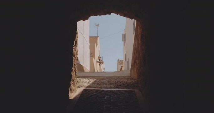 An Alley From the Perspective Inside an Archway on the Small Island of Tabarca