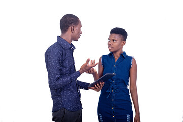 young man showing a woman a path while pointing the finger aside.