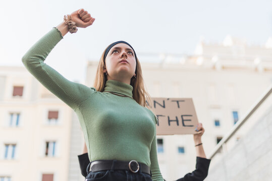 Woman protesting on street during Black Lives Matter demonstration