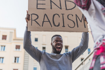 Black man protesting during Black Lives Matter demonstration
