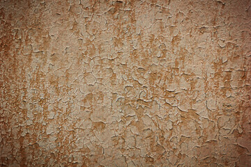 Old painted wall damage surface. Background of old red wall