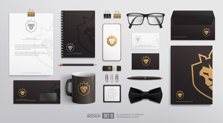 Corporate Business Stationery Brand Identity Mockup set with lion crown icon logo. Business Stationery items mockup. Branding mock-up of  notepad, blank, envelope, business card, Golden logotype 