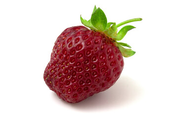 Fresh strawberries with green leaves isolated on white background. Delicious red fruit.