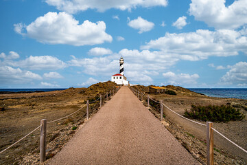 lighthouse on the coast of menorca island, spain