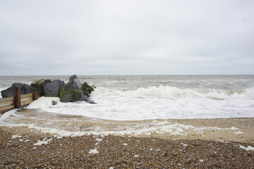 Waves on the cloudy day photographed at Horsey Gap in June 2021