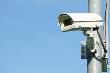 CCTV camera on pole background blue sky ,concept security in home, office,public, ect