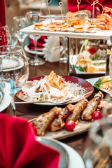 Caesar salad on the festive table in the cafe