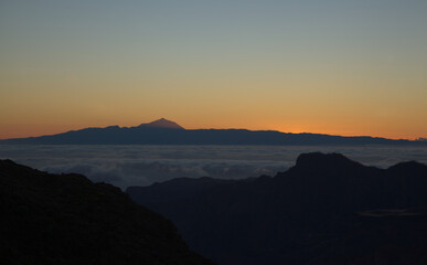 Gran Canaria, landscape of the central part of the island, Las Cumbres, ie The Summits, short hike between rock Formation 
Chimirique and iconic Roque Nublo, evening light