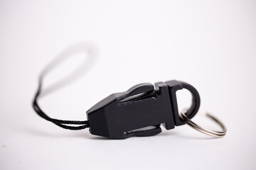 a black plastic lock is isolated on a white background