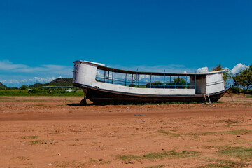 Old wooden boat abandoned in the drought of the São Francisco River Bahia Brazil