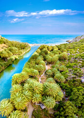 Preveli beach at Libyan sea, river and palm forest, southern Crete , Greece