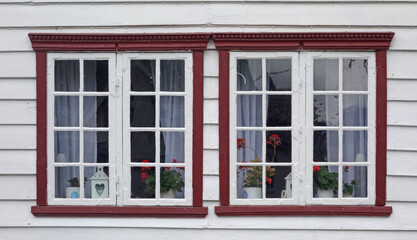 Fototapeta premium glass window with red frame, Hellesylt, Norway